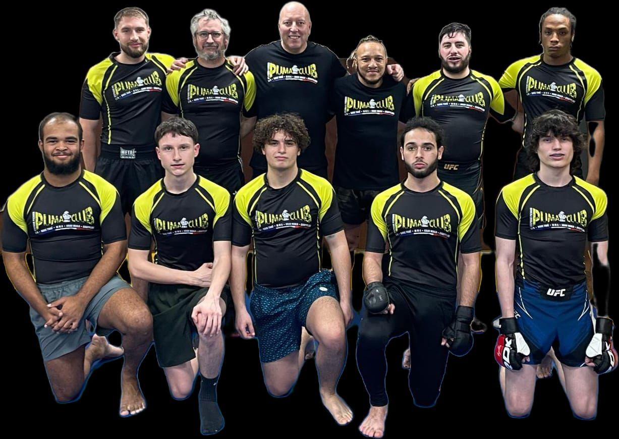L'équipe compétition du Puma Club en t-shirt jaune et noir.
